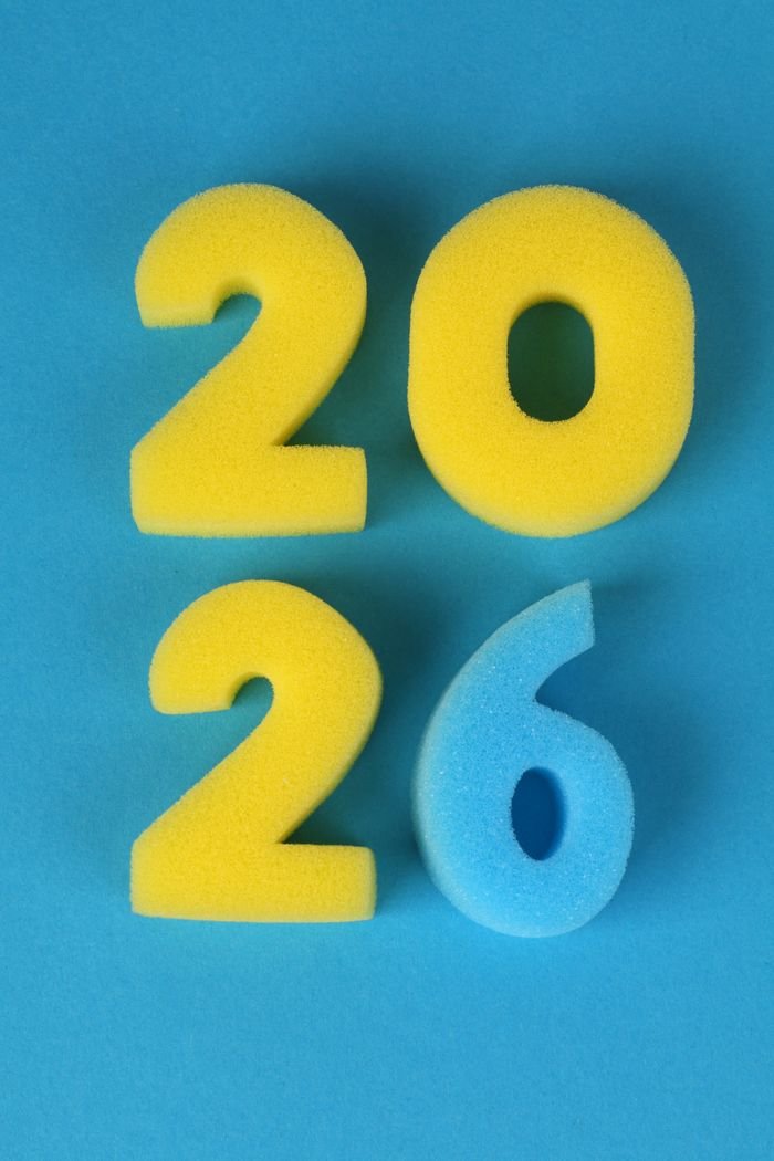 Bright yellow and blue foam numbers forming the year 2026 on a matching background.
